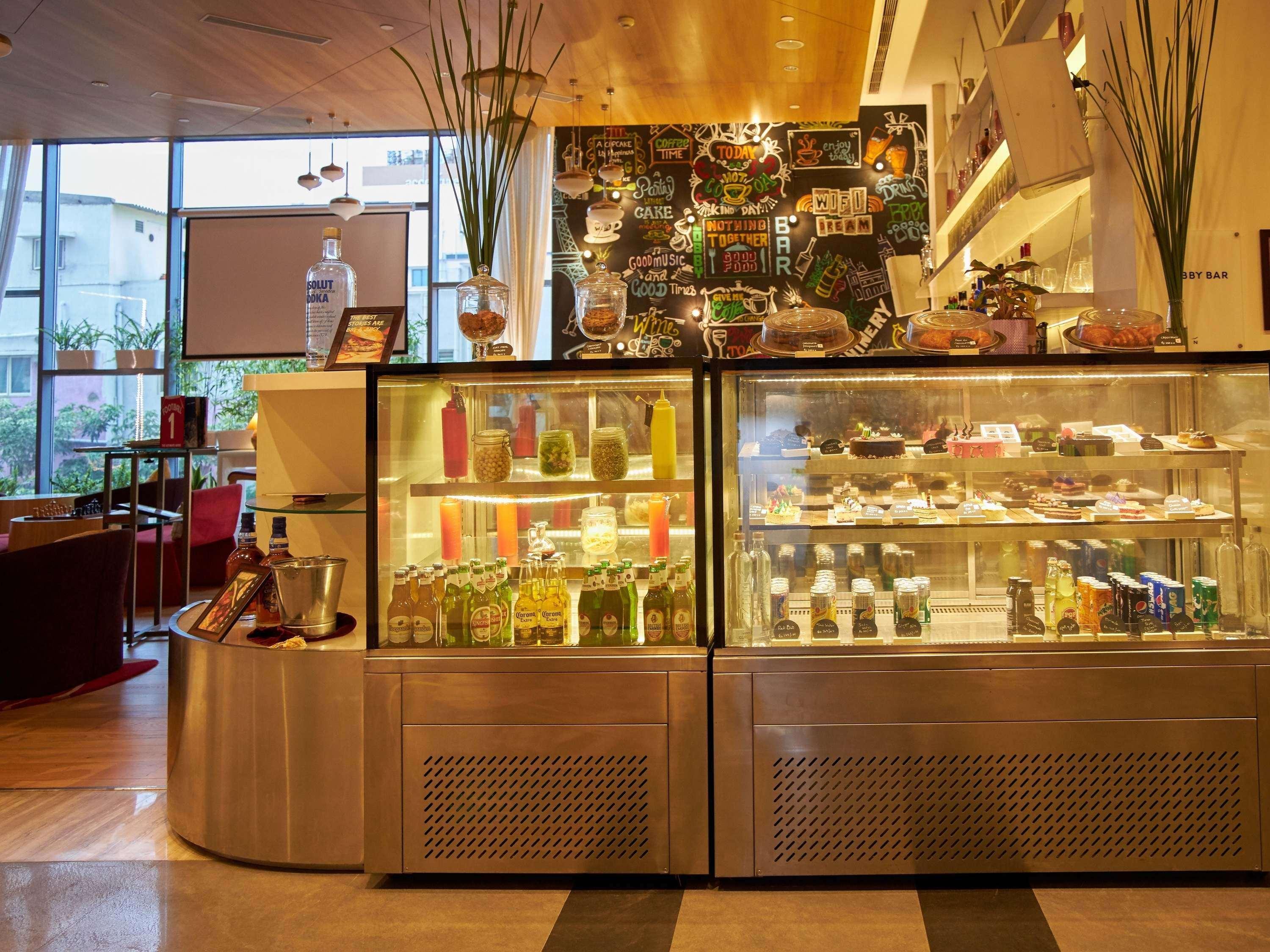 Novotel Chennai Sipcot Екстериор снимка The pastry counter at the lobby