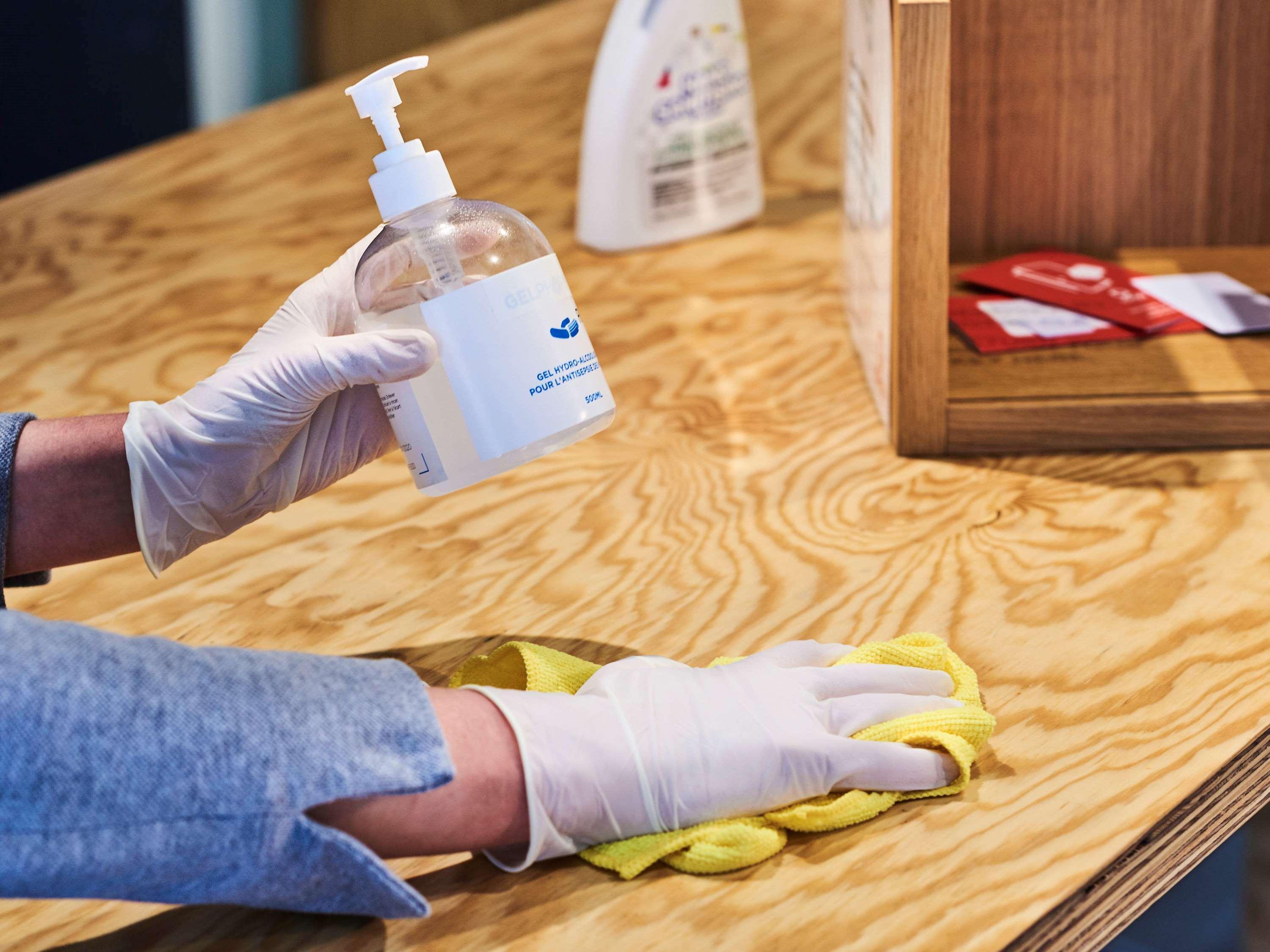 Novotel Chennai Sipcot Екстериор снимка Disinfection of a table with a disinfectant
