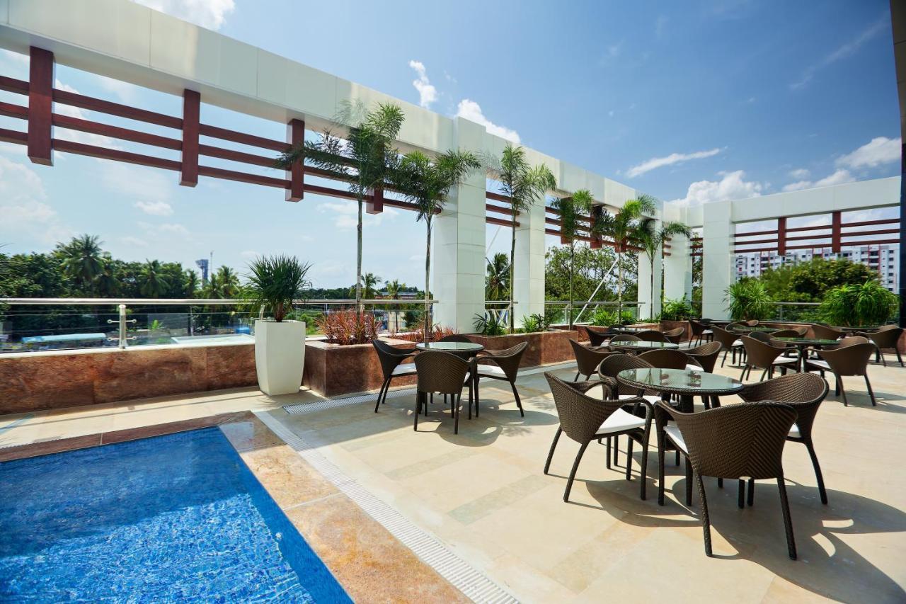 Novotel Chennai Sipcot Екстериор снимка Rooftop pool at the hotel